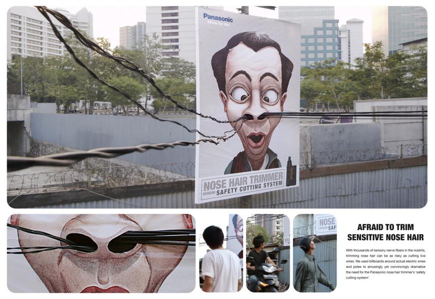 パナソニック鼻毛トリマーの屋外広告。高圧電線を鼻毛に見立てた有名な屋外広告で、バカバカしいけど印象に残ります。<インドネシア>